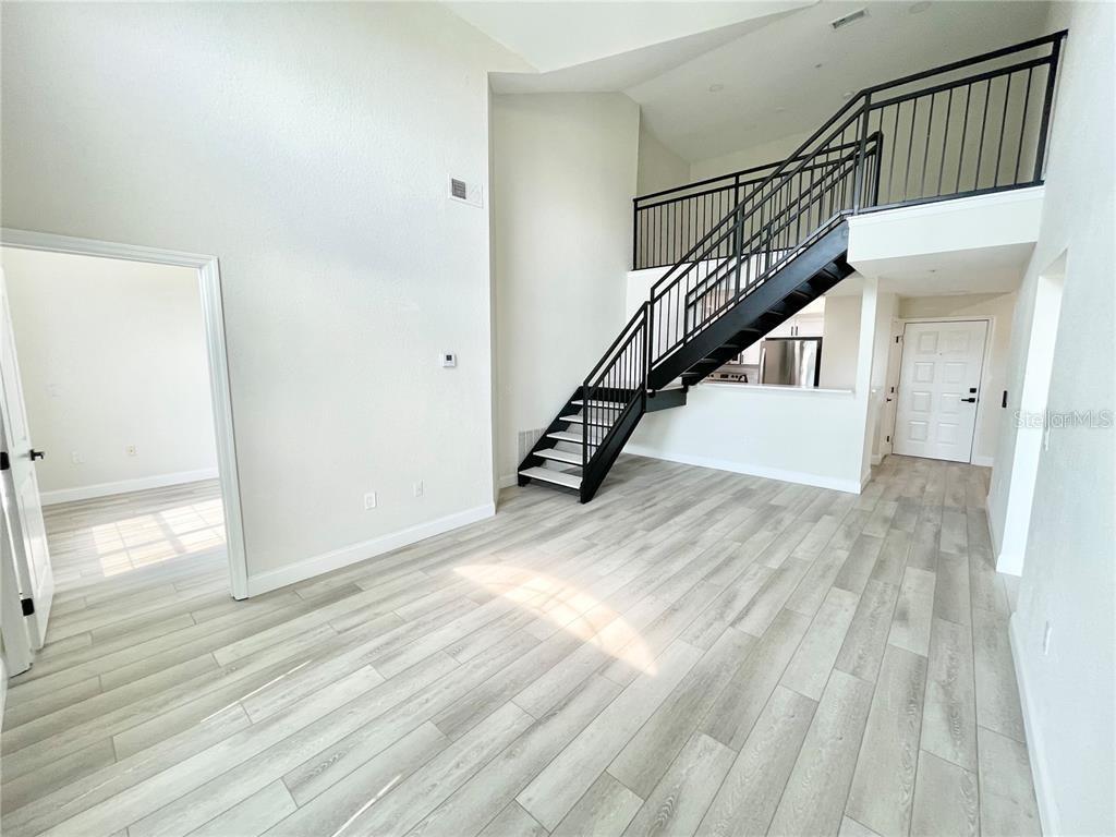 4221 West Spruce Street, Unit 2401 Tampa, FL 33607 - Photo 3 of 22 a view of entryway with wooden floor