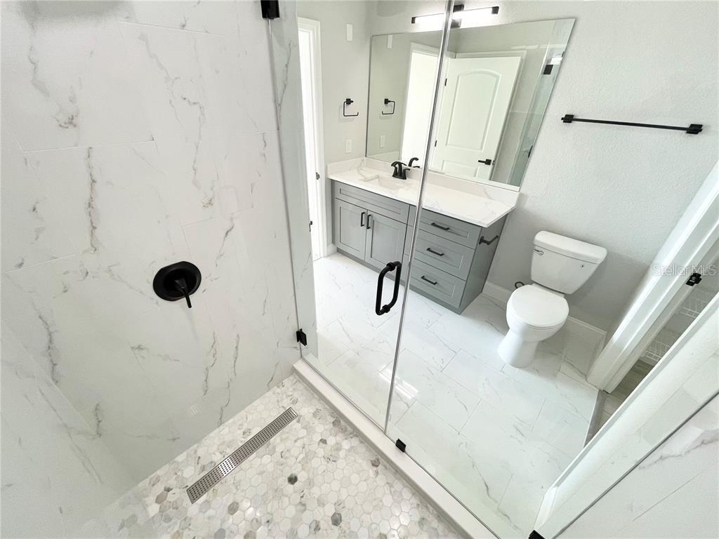 4221 West Spruce Street, Unit 2401 Tampa, FL 33607 - Photo 10 of 22 a bathroom with a shower