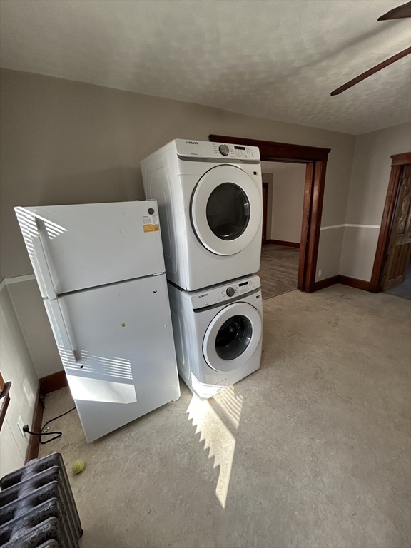 6 Boyden Street, Unit 1F Webster, MA 01570 - Photo 3 of 7 a utility room with dryer and washer