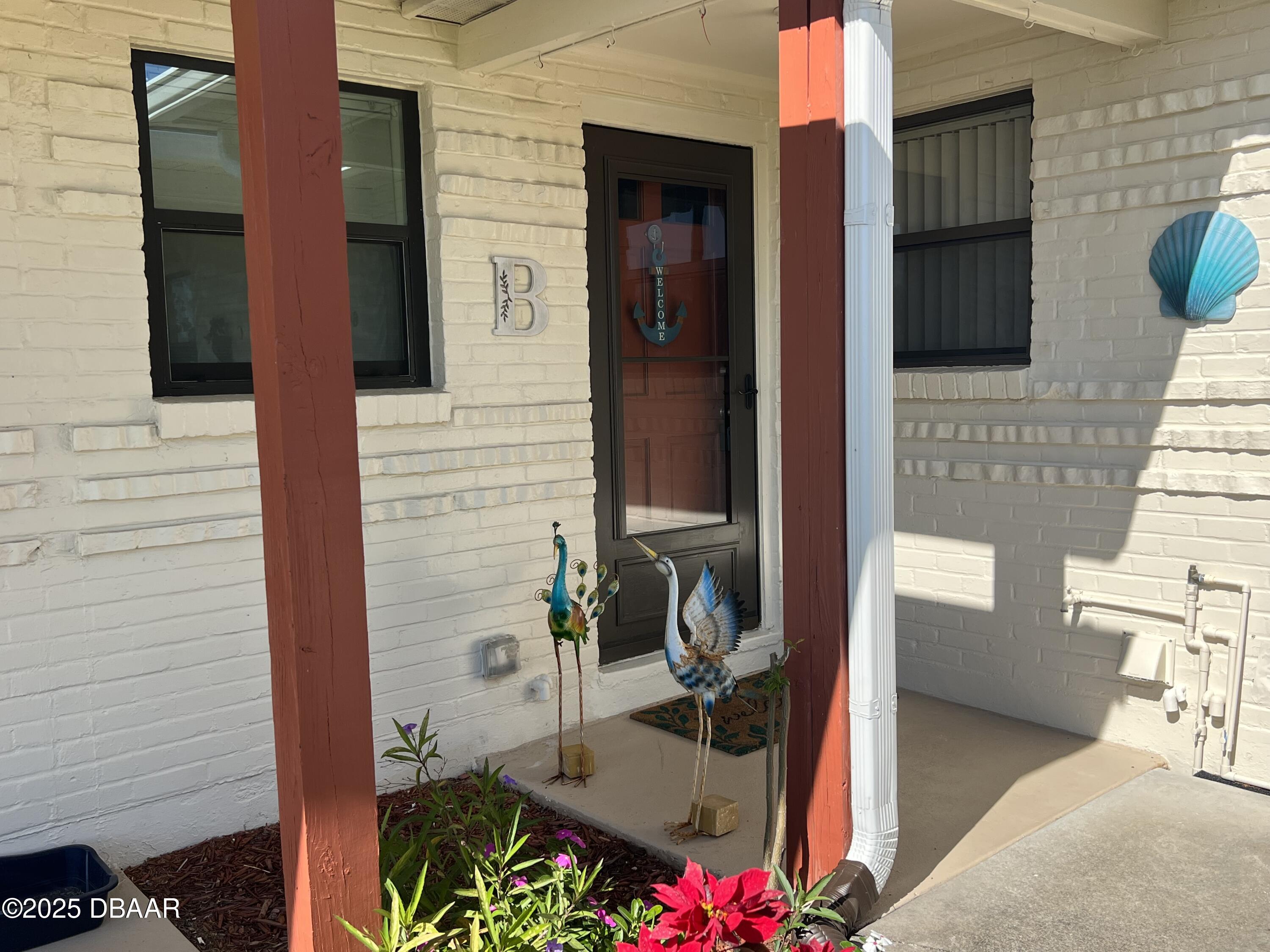 601 Robin Road, Unit B Ormond Beach, FL 32176 - Photo 3 of 28 IMG_3588