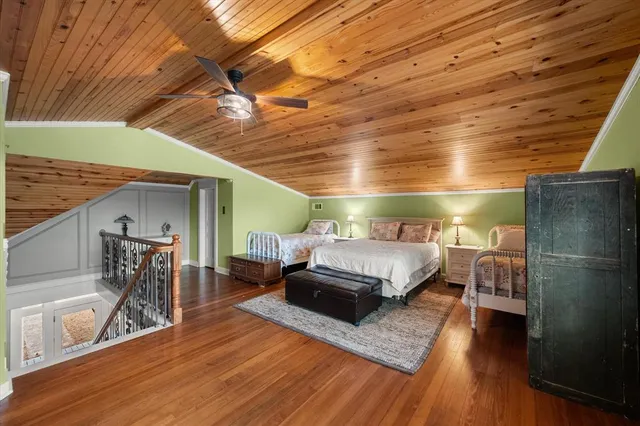 a bathroom with a toilet a sink and a mirror