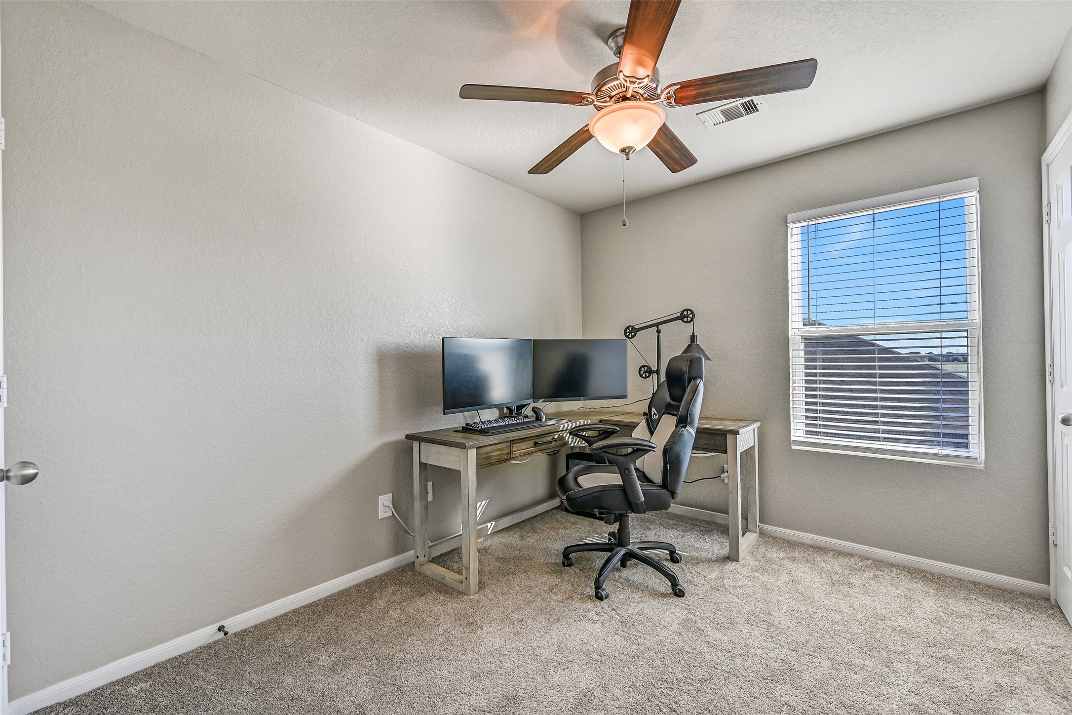 4206 Brightridge Court Rosenberg, TX 77471 - Photo 19 of 27 a view of a workspace with a window