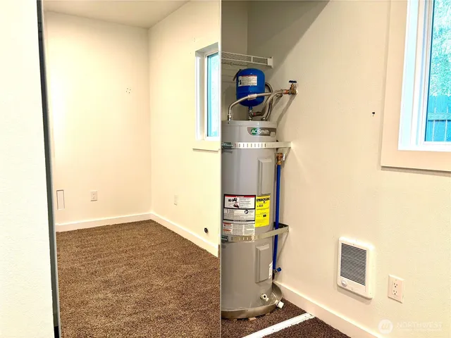 a picture of a bathroom with a window