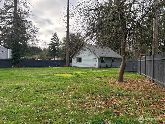 a house view with a garden space