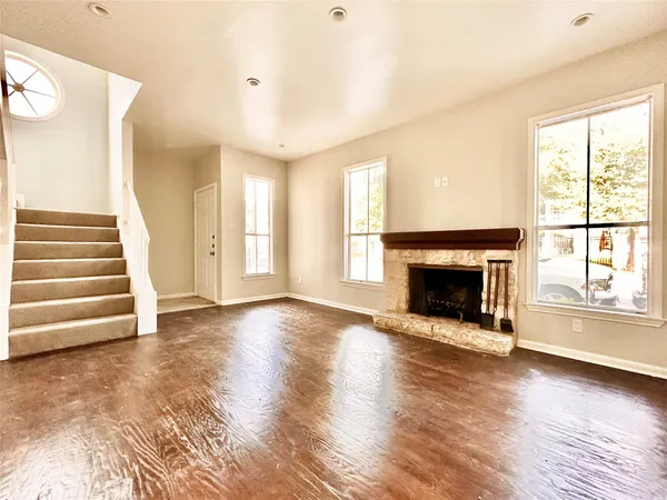 a kitchen with a white cabinets and white appliances