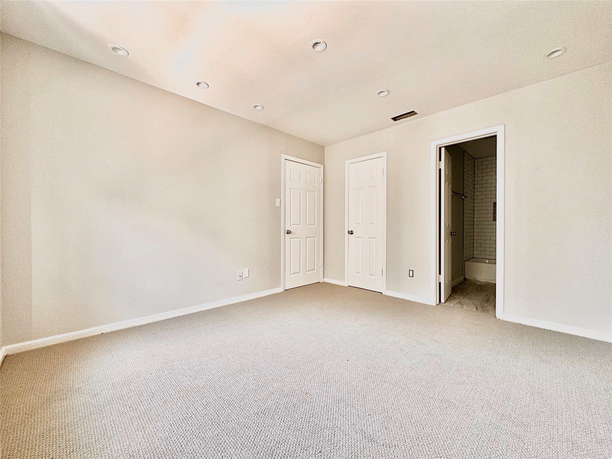 2529 Rio Grande Street, Unit 1 Austin, TX 78705 - Photo 6 of 9 an empty room with closet area