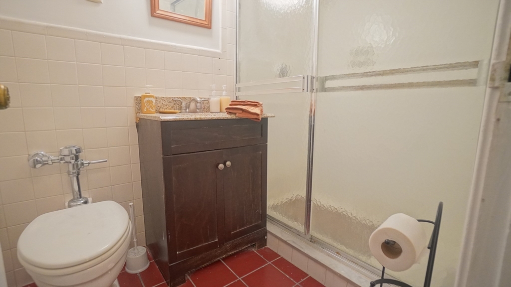 140 Chestnut Street, Unit 314 Springfield, MA 01103 - Photo 18 of 21 a bathroom with a toilet and a shower