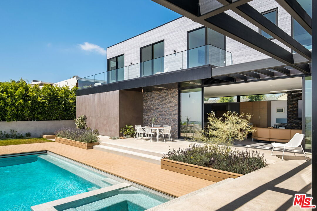 a view of a house with a swimming pool