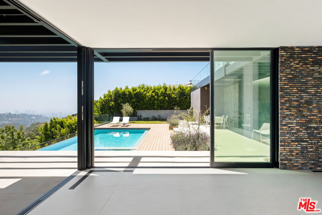 2200 Stradella Road Los Angeles, CA 90077 - Photo 6 of 27 a view of a door and a window