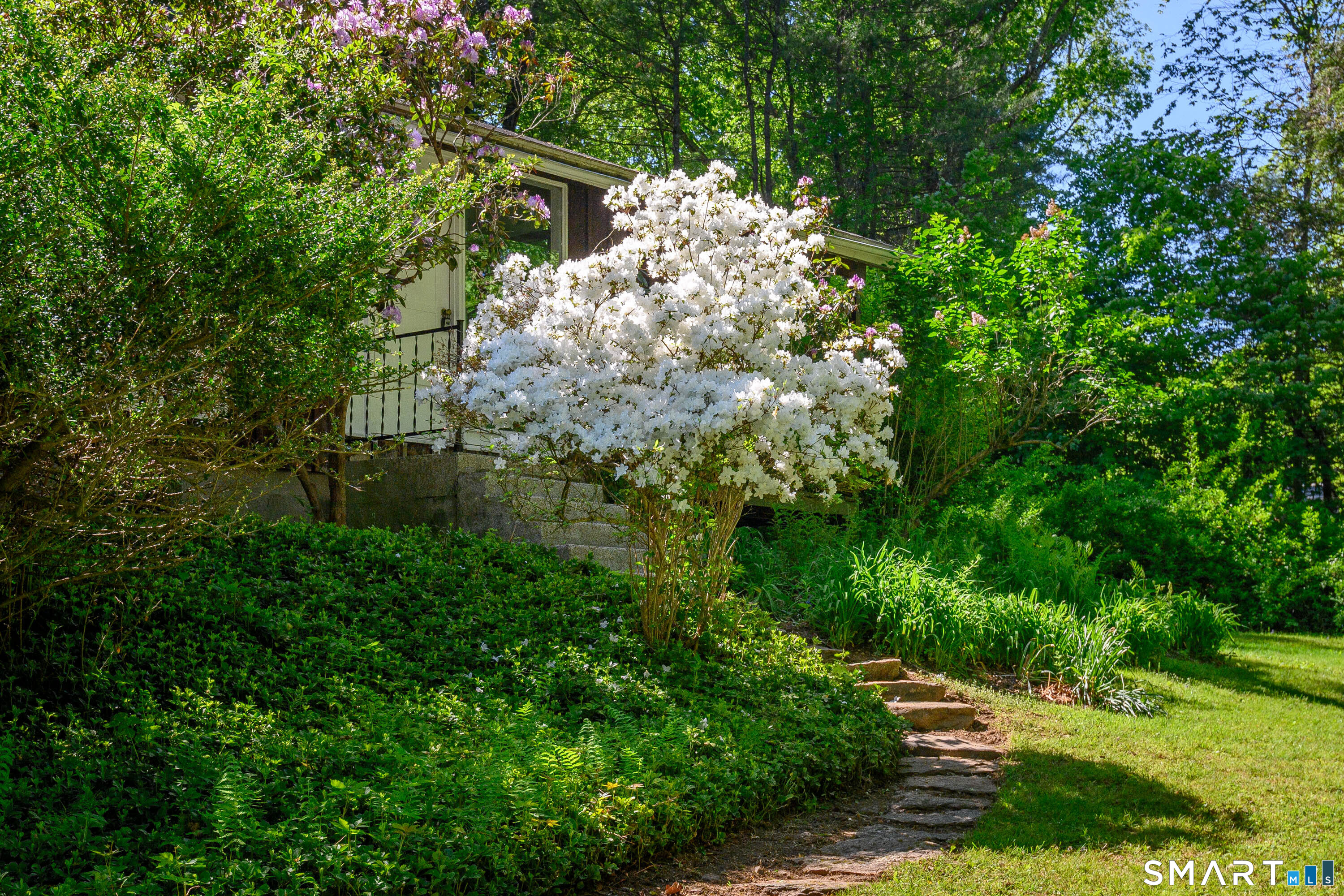4 Pepper Pond Road Sherman, CT 06784 - Photo 4 of 33 a backyard of a house with lots of green space