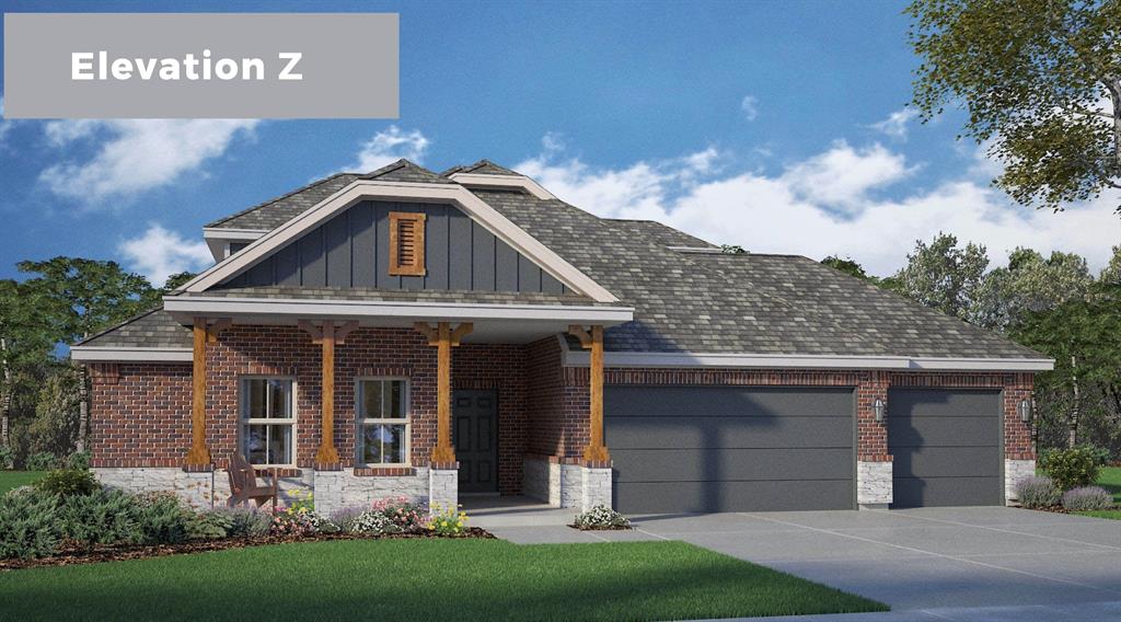 View of front of house with a porch, brick siding, and board and batten siding