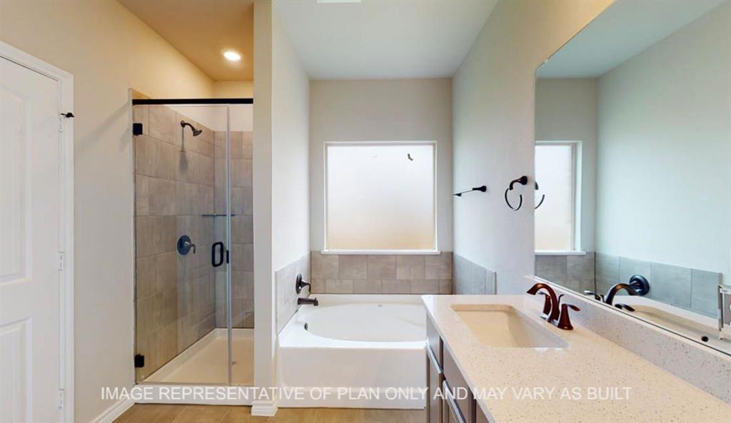 10720 Granada Drive Waco, TX 76708 - Photo 14 of 25 Full bathroom with vanity, a garden tub, and a shower stall