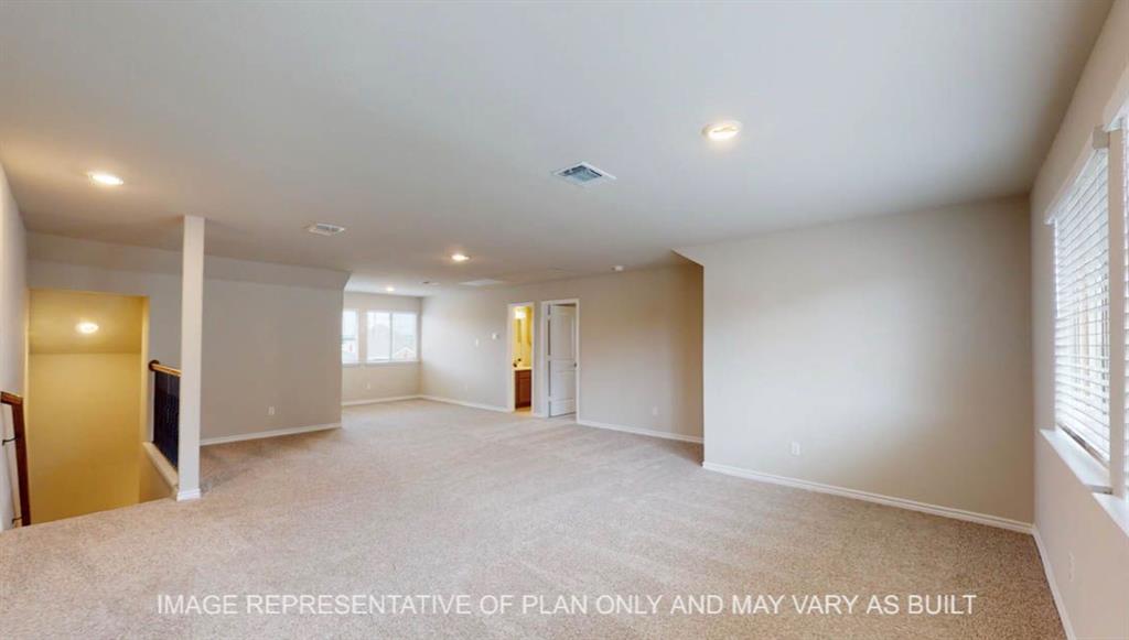 10720 Granada Drive Waco, TX 76708 - Photo 16 of 25 Spare room featuring light colored carpet and recessed lighting