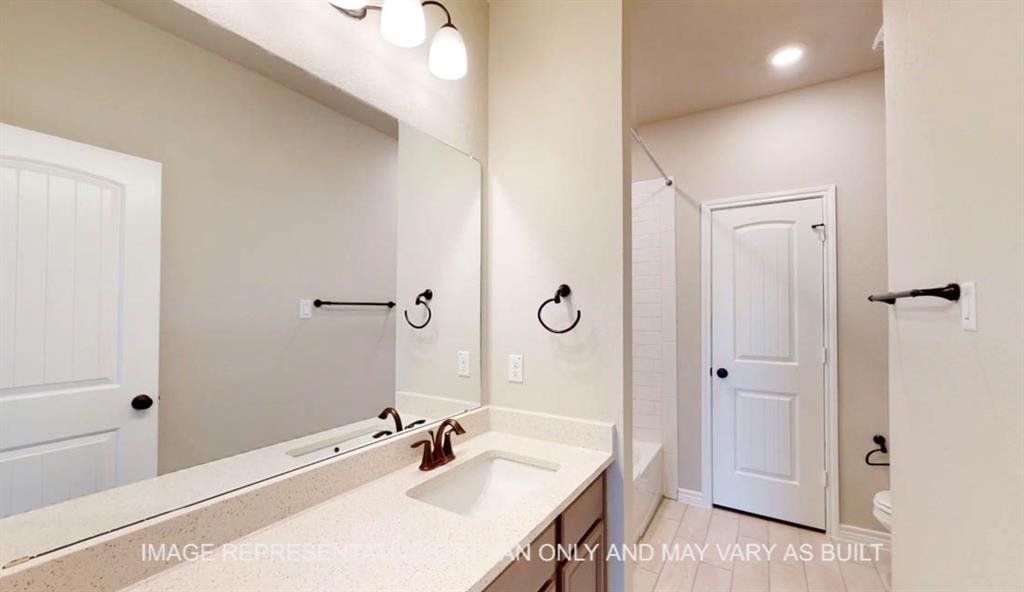 10720 Granada Drive Waco, TX 76708 - Photo 20 of 25 Full bath with vanity, shower / bath combination, light tile patterned flooring, and recessed lighting