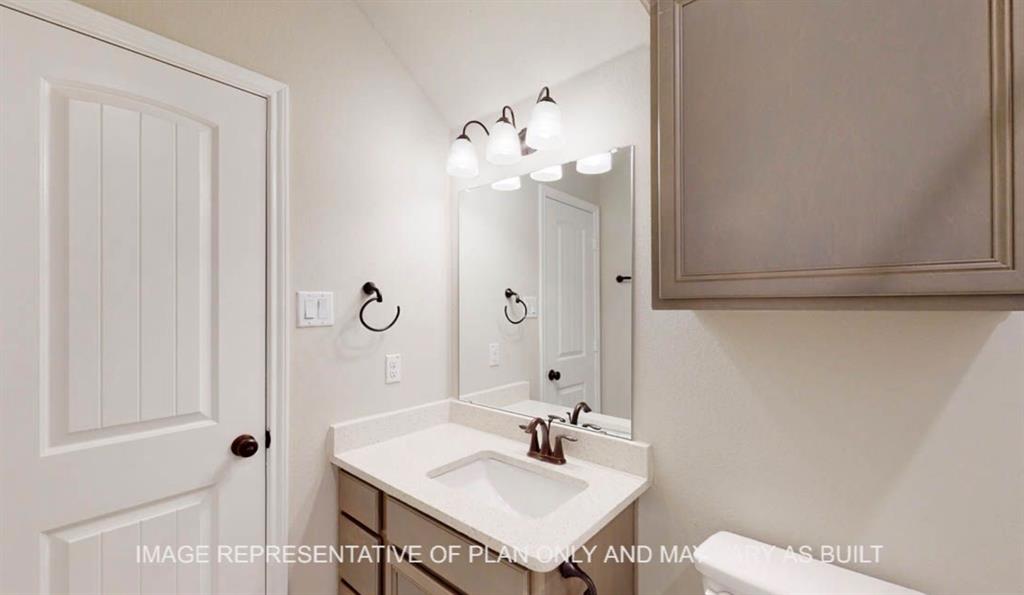 10720 Granada Drive Waco, TX 76708 - Photo 24 of 25 Half bathroom featuring vanity and toilet