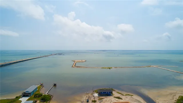 a bathroom with a toilet and a bathtub