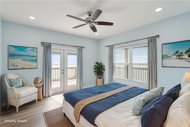 an empty room with cabinet and windows