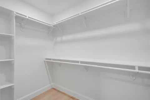 a view of an empty walk in closet