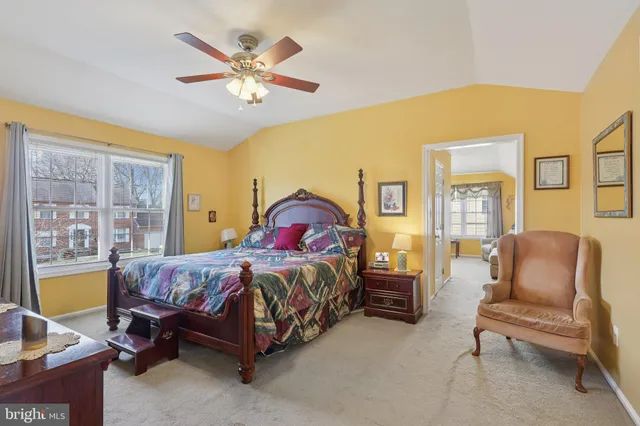 a view of a deck with table and chairs with wooden floor and fence
