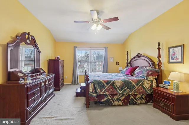 a view of a roof deck with table and chairs and wooden floor