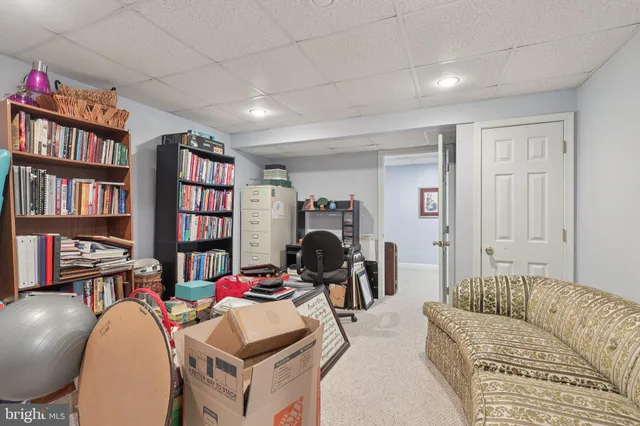 a picture of a cabinet with a white and white wall