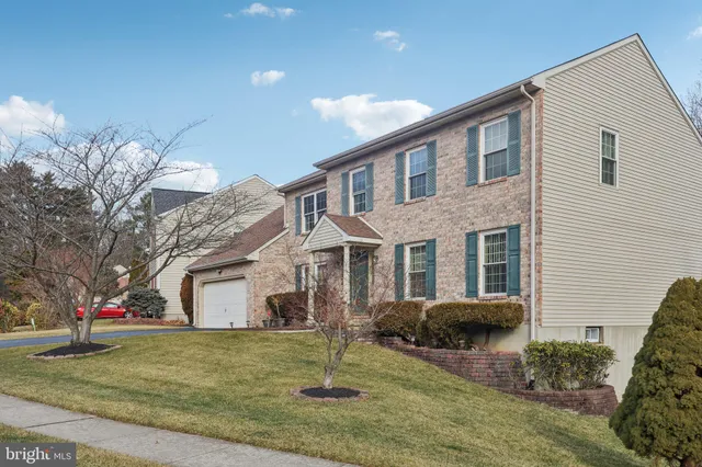 a kitchen with a stove a sink and a refrigerator