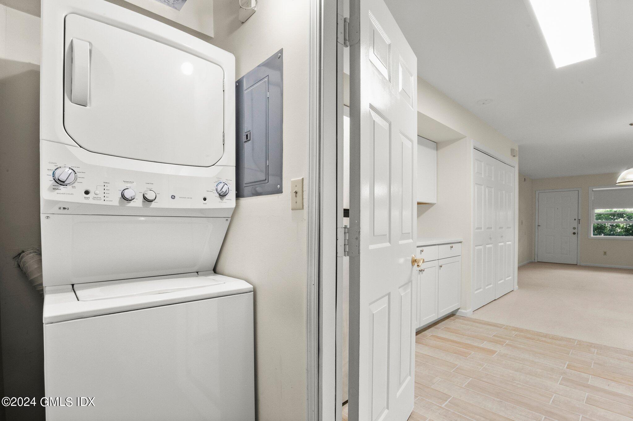 351 Pemberwick Road, Unit 109 Greenwich, CT 06831 - Photo 9 of 9 a view of washer and dryer