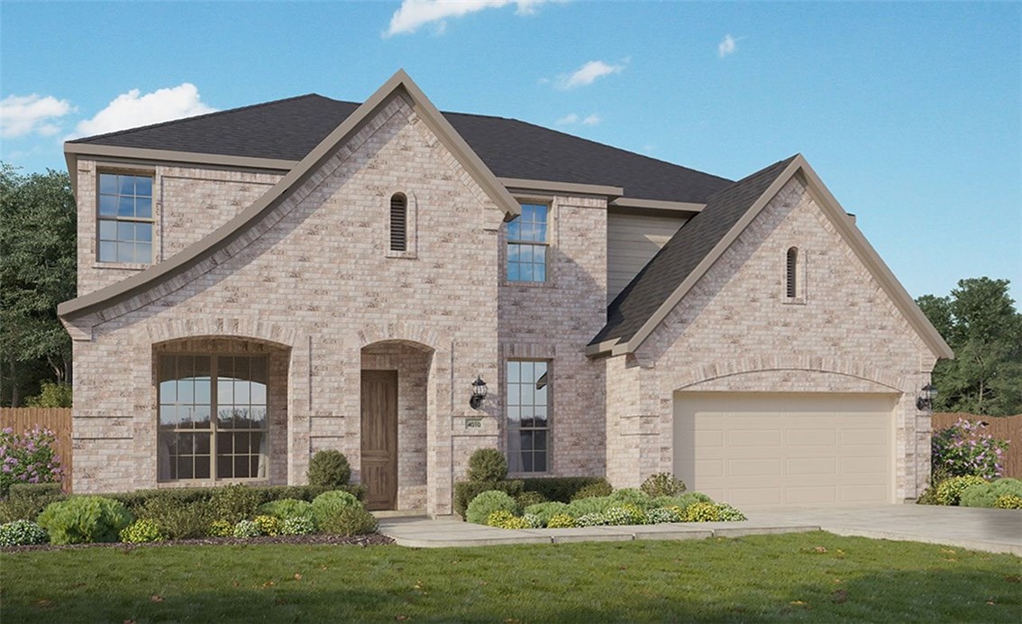 19305 Stembridge Run Pflugerville, TX 78660 - Photo 1 of 1 a front view of a house with a yard and garage