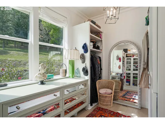 a bathroom with a sink mirror and a bathtub