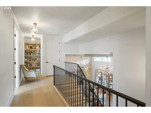 a view of a dining room with furniture and a floor to ceiling window