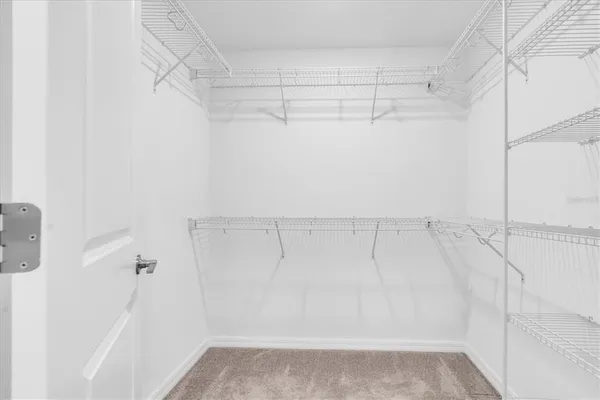 a view of a room with racks on the wall