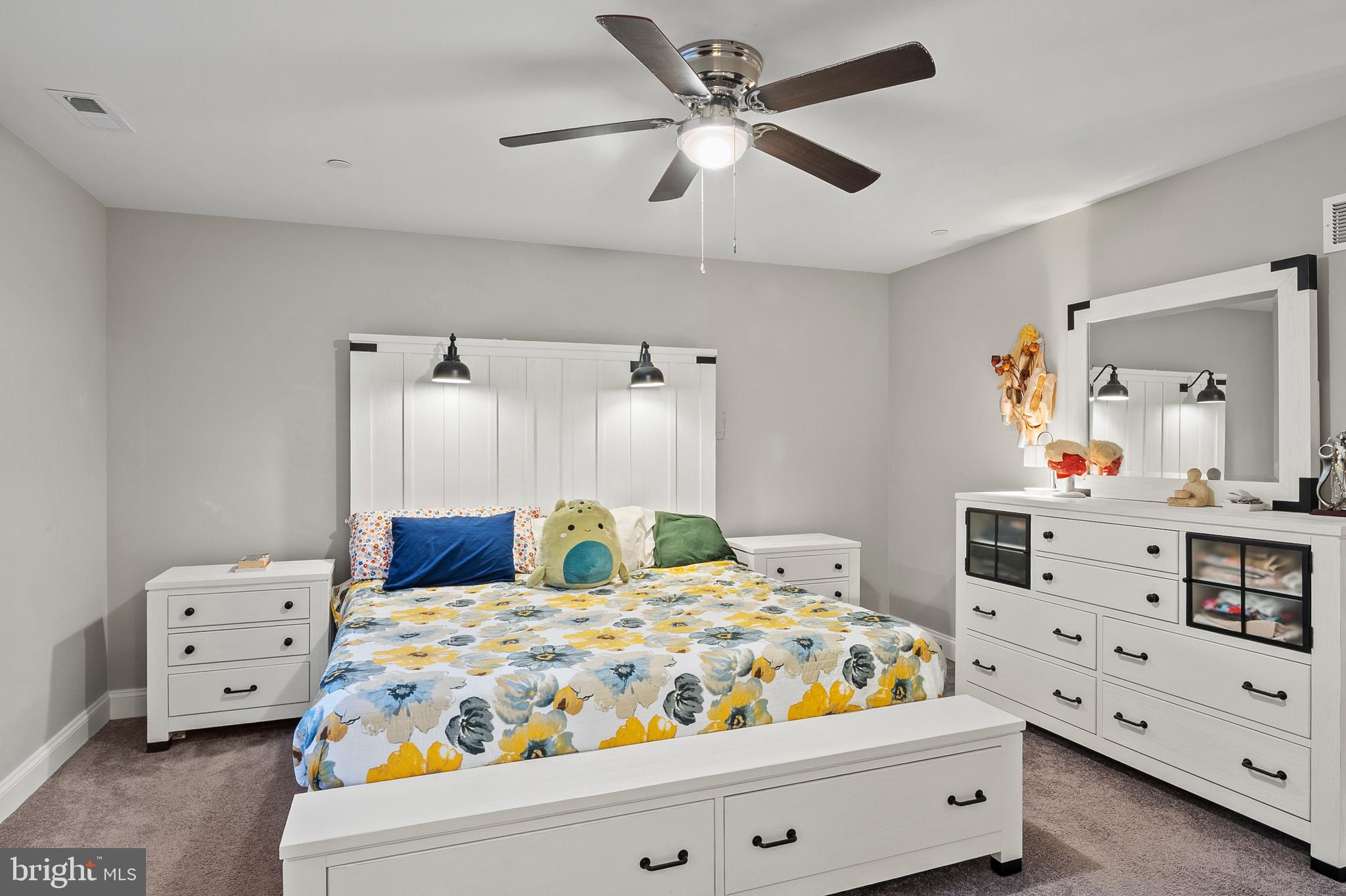 898 Marigold Road Glen Burnie, MD 21060 - Photo 16 of 33 a bedroom with a bed and a dresser