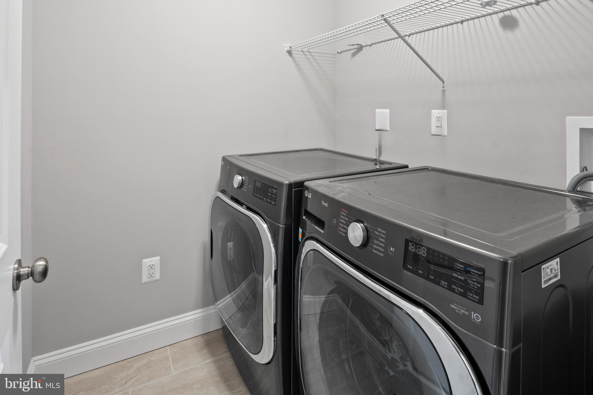 898 Marigold Road Glen Burnie, MD 21060 - Photo 25 of 33 a utility room with dryer and washer