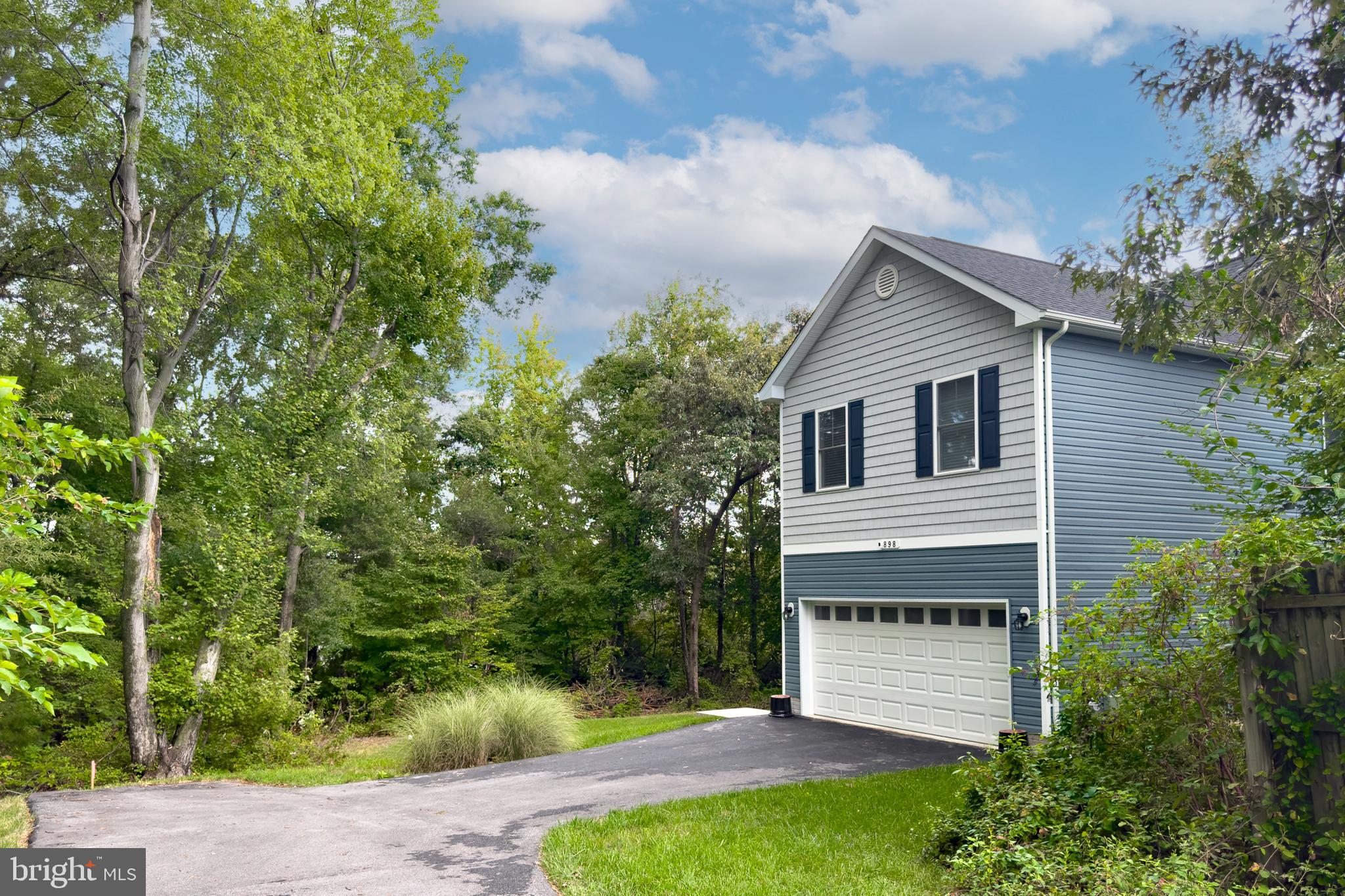898 Marigold Road Glen Burnie, MD 21060 - Photo 4 of 33 a view of a house with a yard