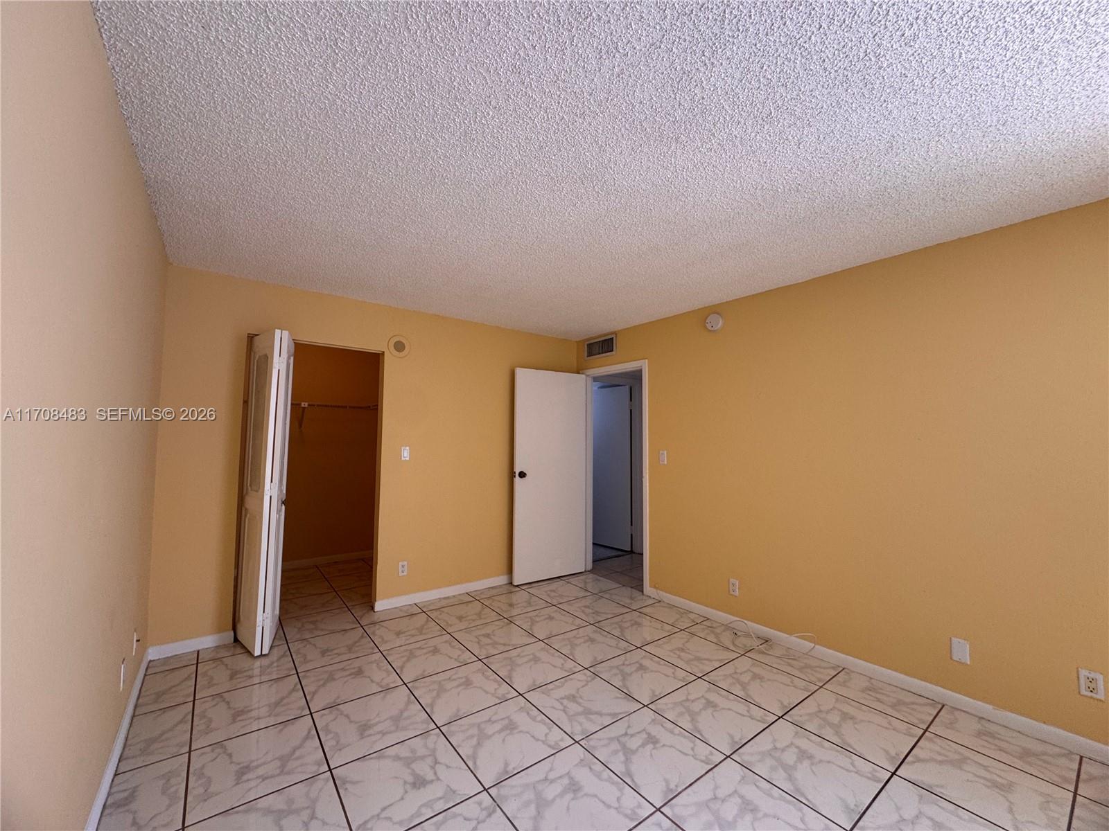 16919 North Bay Road, Unit 117 Sunny Isles Beach, FL 33160 - Photo 13 of 20 a view of an empty room