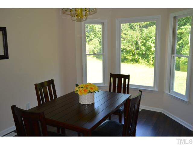232 Pope Lake Road Angier, NC 27501 - Photo 9 of 15 a view of a dining room with furniture and window