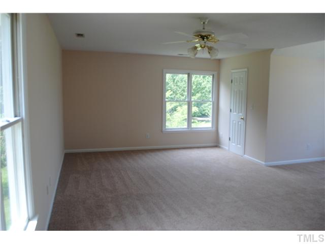 232 Pope Lake Road Angier, NC 27501 - Photo 10 of 15 a view of an empty room with a window