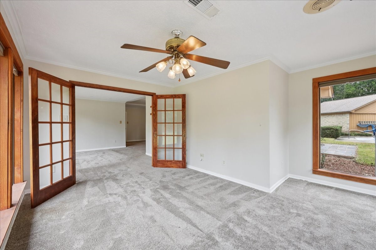 3805 Huntwick Street Orange, TX 77632 - Photo 12 of 43 a view of an empty room with a window