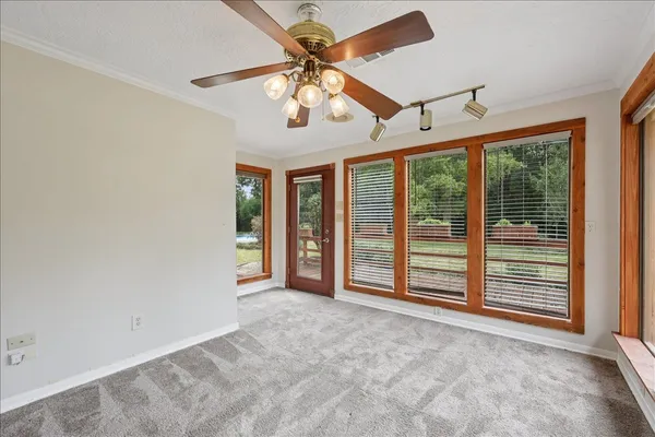 en view interior of a house with a large window with kitchen view