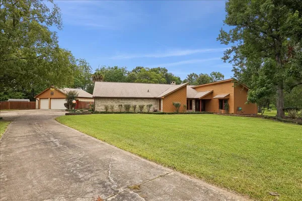 a aerial view of a house with garden