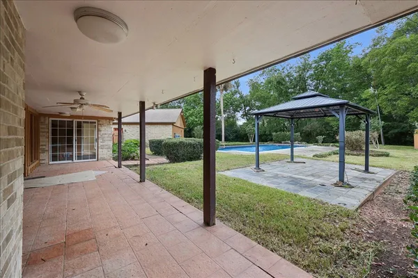 a view of a house with swimming pool