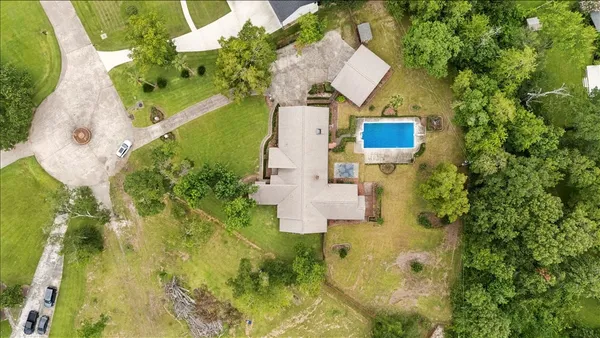 an aerial view of house with yard
