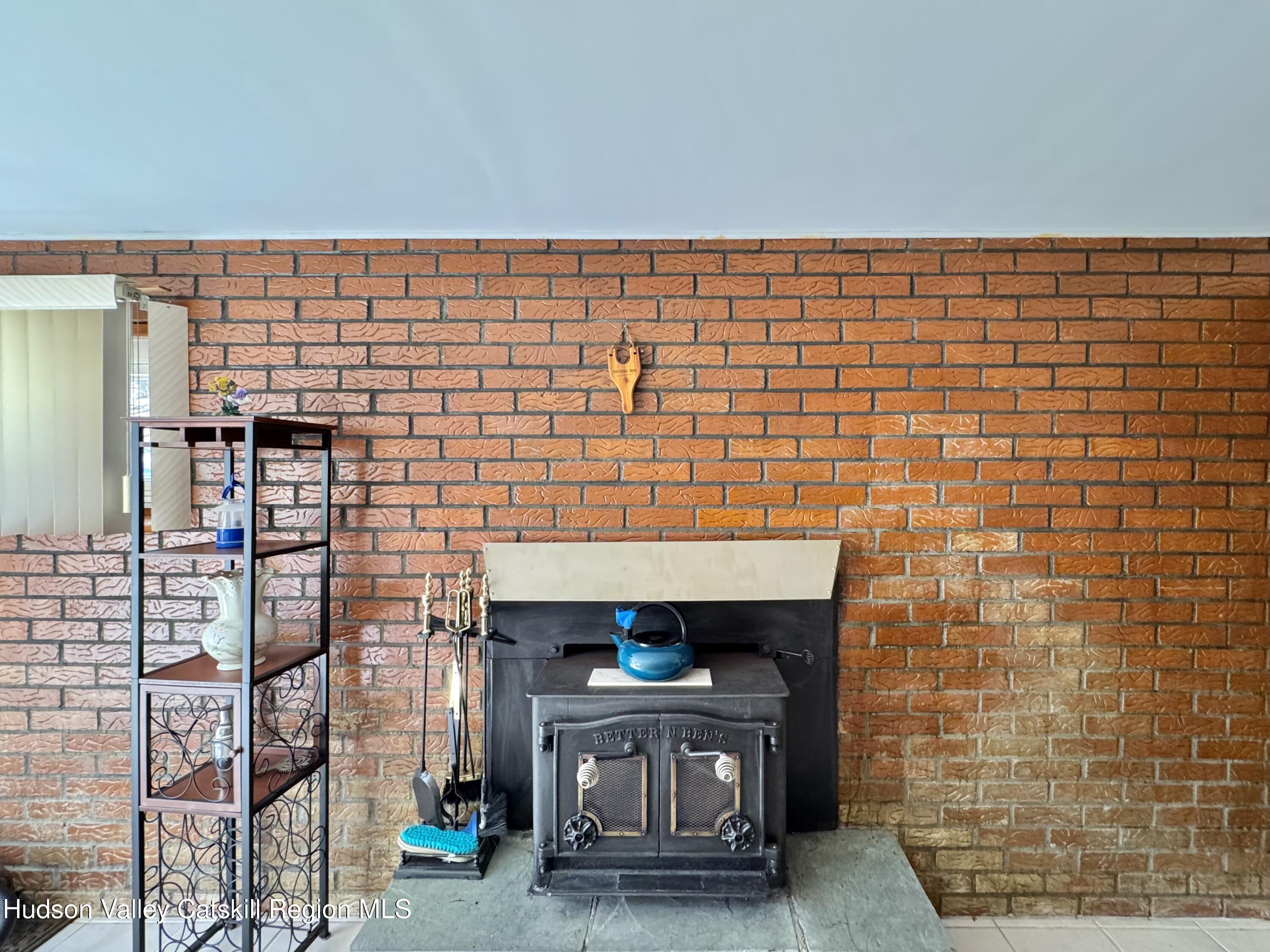 6339-6347 Highway 32 Catskill, NY 12413 - Photo 15 of 35 a room with a wall
