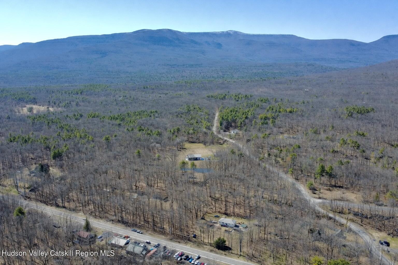 6339-6347 Highway 32 Catskill, NY 12413 - Photo 34 of 35 a view of a dry field with mountains in the background