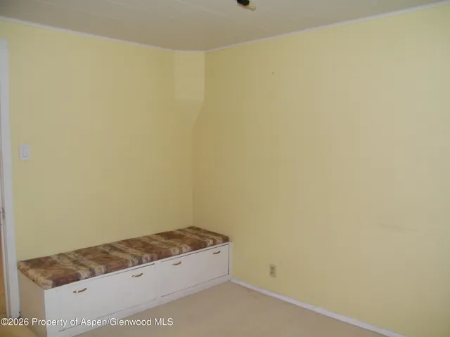 a view of a room with a window