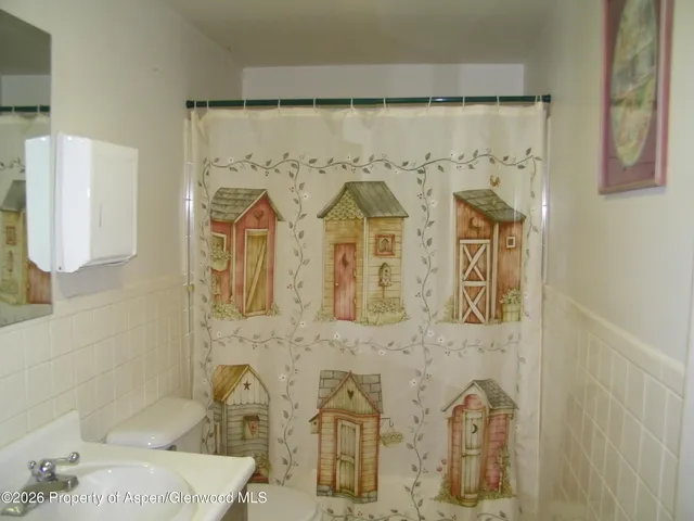 a view of a room with a window