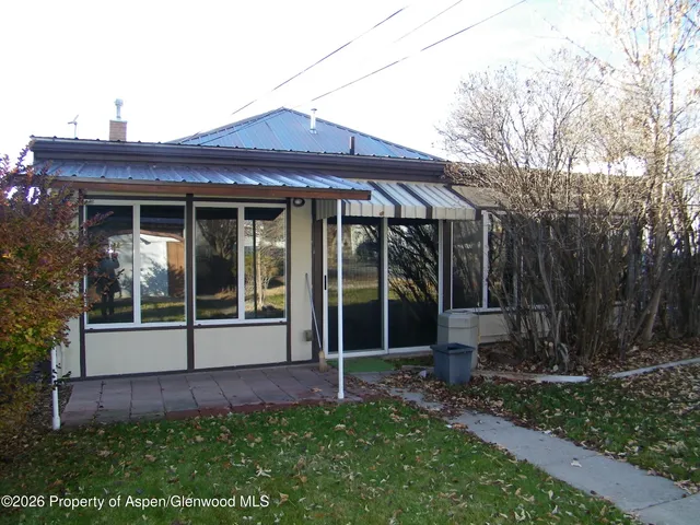 a view of a house with a garden