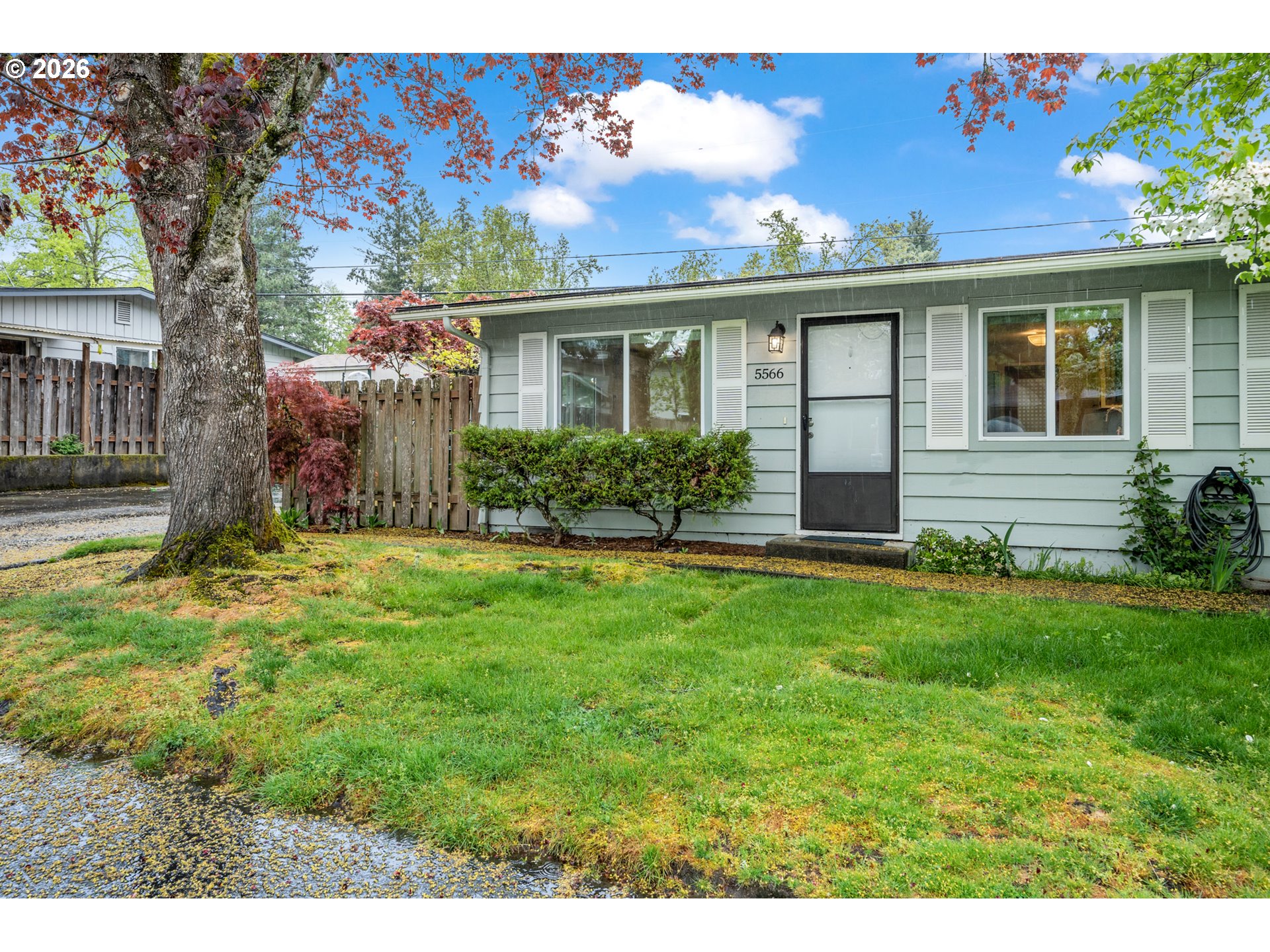 5566 Southwest Erickson Avenue Beaverton, OR 97005 - Photo 2 of 31 a front view of house with yard and green space