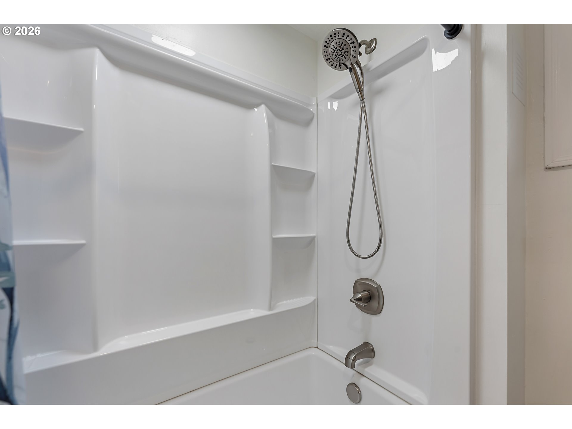 5566 Southwest Erickson Avenue Beaverton, OR 97005 - Photo 22 of 31 a bathroom with a shower