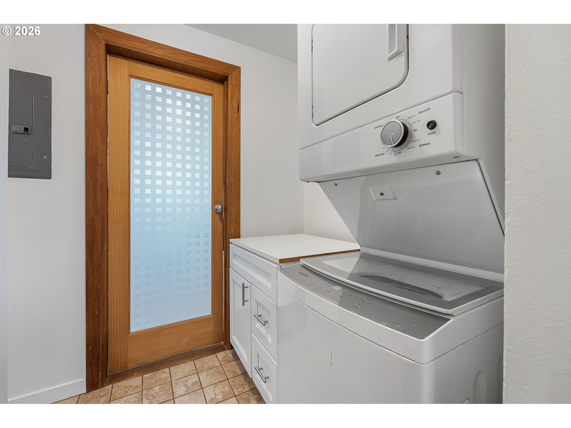 5566 Southwest Erickson Avenue Beaverton, OR 97005 - Photo 24 of 31 a utility room with dryer and washer